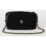 Chanel Persian lamb medium flap handbag, executed in black, with strap, label to interior, Neiman