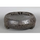 Chinese large composition 'inkstone', of drum form featuring meandering dragons, base marked, 13.5"