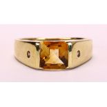 Citrine, diamond and 14k yellow gold ring Featuring (1) faceted top rectangular-cut citrine,