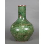 Chinese peach bloom glazed porcelain vase, with a cylindrical neck, above a compressed body, 13.75"