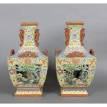 Pair of Chinese porcelain double wall vases, of hu form of square sectioned, the neck with