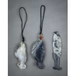 (lot of 3) Chinese hardstone toggles, each of fish form, executed from a gray-white matrix, longest: