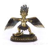 Himalayan copper alloy sculpture of Garuda, standing above a mermaid on a separate lotus pedestal (