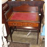 English Edwardian mahogany writing desk, having a burgundy leather writing surface, over a two