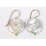 Pair of cultured coin pearl and gold-filled earrings Featuring (2) 19 mm, cultured coin pearls,