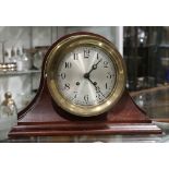 American Chelsea ships clock, the round brass face with wood case, having a micrometer regulator,