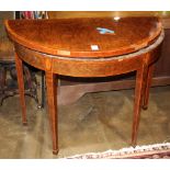 Federal flip top games table, having a demi-lune form and a hinged lid, with neoclassical inlaid