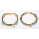 (Lot of 2) Jadeite and 14k yellow gold bracelets Including 1) jadeite and 14k yellow gold squared