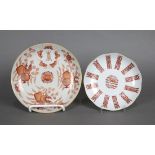 (lot of 4) Chinese coral red enameled porcelain plates: one pair, with a foliate rim encircled by