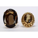 (Lot of 2) Smokey quartz, citrine and yellow gold rings Including 1) oval-cut smokey quartz,