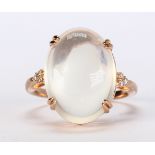 Moonstone, diamond and 14k rose gold ring Featuring (1) oval moonstone cabochon, measuring