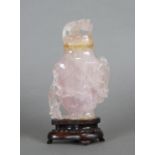 Chinese rose quartz urn, the flattened tapering body flanked by a pair of chilong carved in