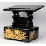 Japanese black lacquered kendai reading stand, decorated with chrysanthemums and family crest in