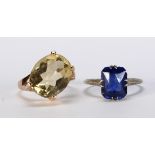 (Lot of 2) Citrine, synthetic sapphire and gold rings Including 1) oval-cut citrine, 14k yellow gold