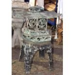Asian pagoda form cast iron lantern, rising on a footed base, 31"h x 25"dia.