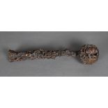 Chinese boxwood ruyi scepter, the head and contoured shaft carved and pierced with pomegranate, 13.