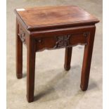 Chinese wooden side table, with a single panel top, above an apron carved with shou emblem in low