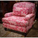 Pair of Victorian style oversize club chairs, having red and white upholstery and rising on turned