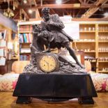 French figural mantle clock, depicting a figure of a poet grasping a book, possibly Luis de