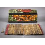 (lot of 2) Balinese manuscript and box, the polychrome wood box carved with various demons, interior