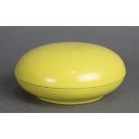 Chinese yellow glazed porcelain circular covered box, with a domed lid and the base of box with