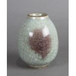 Chinese Jun type ovoid jar, the body with a splash of purple, with dark crackles on grey ground, 4.