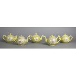 (lot of 5) Chinese yellow porcelain teapots, with stylized louts and scroll tendrils, base with