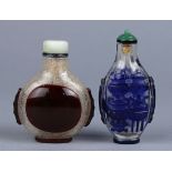 (lot of 2) Chinese overlay glass snuff bottles, 19th century: the first, glass snowflake ground with