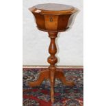 Continental inlaid sewing stand, 19th century, having a hinged polygonal top, opening to a