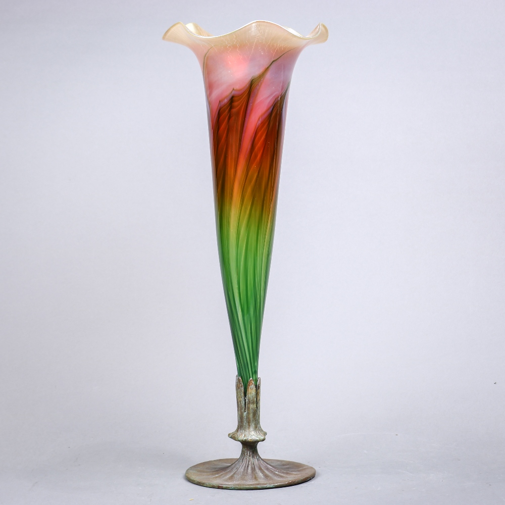 Large Lundberg Studios trumpet form art glass vase, having a flared rim, above the interior with