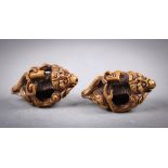 Pair of pit/seed carvings in the form of arhats, the seated figures one with a wine cup and the