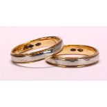 (Lot of 2) 18k two-tone bands Including (2) two-tone 18k yellow and white gold 3.7 mm bands, sizes