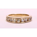 Diamond and 14k yellow gold ring Featuring (11) full-cut diamonds, weighing a total of approximately