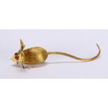 Ruby, 18k yellow gold mouse brooch Designed as a mouse, measuring approximately 58 X 19 mm,