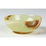 Carved calcite bowl The carved calcite bowl, measures approximately 97 X 37 mm, weighs 176.44 grams