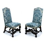 Pair of Jacobean style hall chairs, each having blue upholstery, and rising on inswept feet, 42.5"h