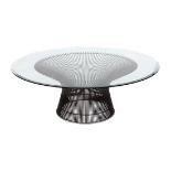 Warren Platner low table, having a bevelled glass top above the corset form bronze finished base,