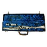 A. Fontaine silverplate clarinet, with associated lined case, 2"h x 22.5"w x 4.5"d