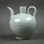 Chinese qingbai glazed ewer, with a cylindrical neck above a globular body having incised stylized