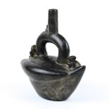 Chimu blackware effigy vessel, Central Coastal Peru (1200 - 1450 A.D.), the press molded blackware