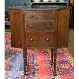 Federal style sewing cabinet, the three drawer case flanked on either side by a trapezoidal