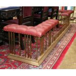 Brass and leather fireplace banquette, 21"h x 8'4.5"w x 23.5"d