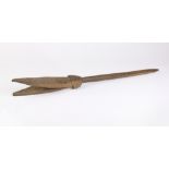 Chancay carved wood peg tool, Central Coastal Peru (1100 - 1400 A.D.), the wooden shaft rising to