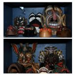 Two bins of decorative carved wood masks, each polychrome decorated with stylized features,