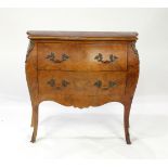 Louis XV style commode, having a shaped top above the two drawer case, and rising on cabriole