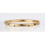 Sapphire and 14k yellow gold bracelet Featuring (14) round-cut sapphires, weighing a total of