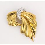 Diamond and 18k yellow gold brooch Featuring (25) full-cut diamonds, weighing a total of