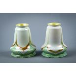 Pair of Steuben art glass shades, early 20th century, having a pulled leave motif with an iridescent