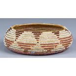 Northwest California Pomo coiled basket, 20th century, having polychrome glass beads integrated into