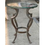 Modern patio table, the patinated metal base with outswept legs, 27"h